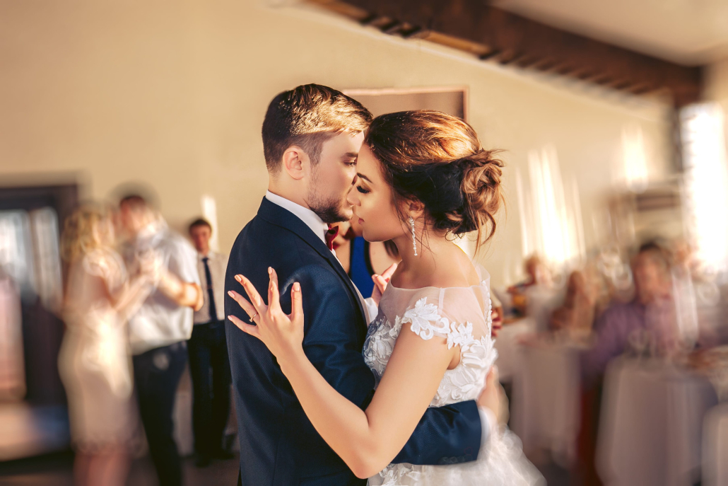 bride and groom dancing